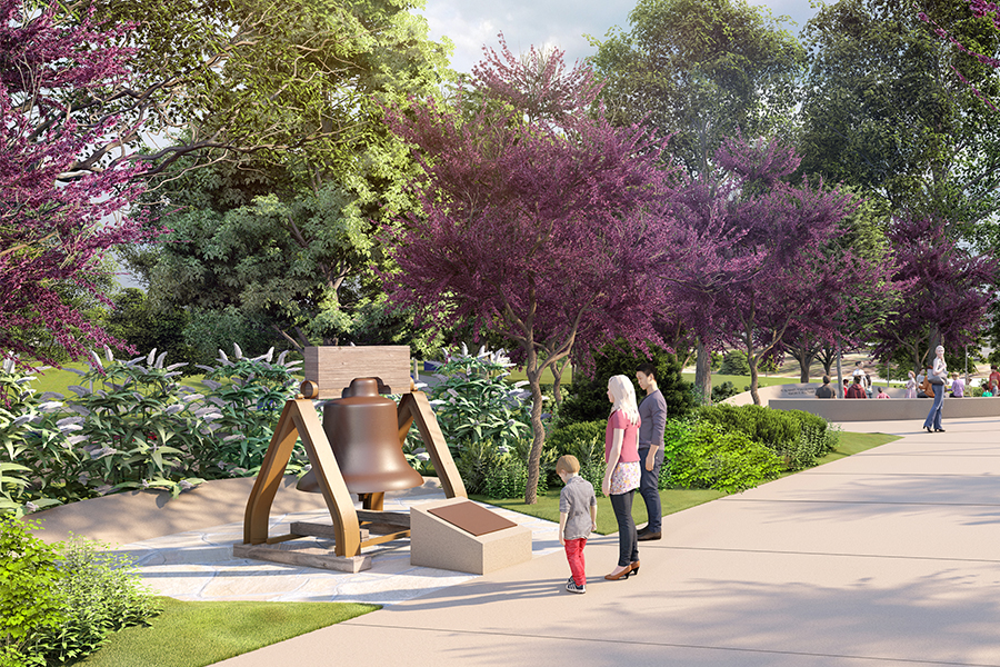 Rendering of a landscaped park walkway featuring a large bronze bell on a wooden frame. Vibrant purple-blossom trees line the path as a small family stops to view the exhibit.